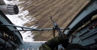 The view from a Russian helicopter as it escorts Russian units in Ukraine in this screengrab obtained from social media, March 2, 2022. (Russian Defense Ministry via Reuters)