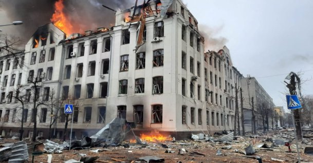 Firefighters extinguish a fire in the Kharkiv regional police department building, which was reportedly hit by recent shelling, in Kharkiv, Ukraine, March 2, 2022. (AFP Photo)