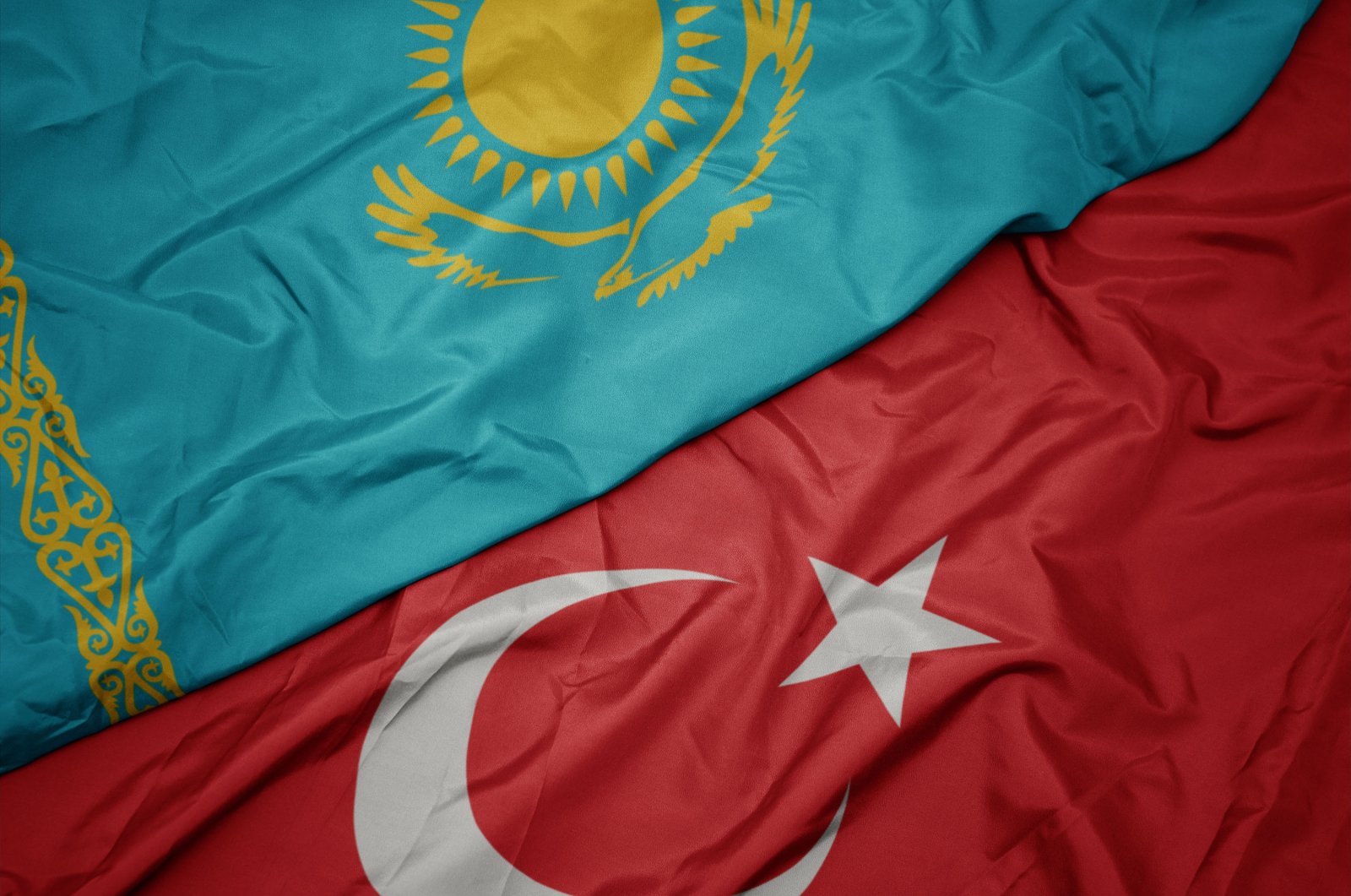 The flags of Kazakhstan and Turkey are seen together in this undated file photo. (Shuterstock File Photo)