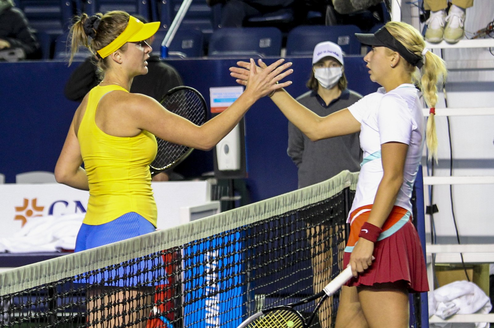 Ukraine&#039;s Elina Svitolina (L) and Russia&#039;s Anastasia Potapova shake hands after their match at the Abierto de Monterrey tennis tournament, Monterrey, Mexico, March 1, 2022. (AP Photo)
