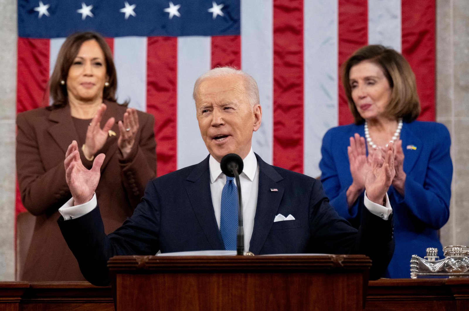 U.S. Vice President Kamala Harris (L) and U.S. House Speaker Nancy Pelosi applaud U.S. President Joe Biden (C) as he delivers his first State of the Union address at the US Capitol in Washington, D.C., U.S. on March 1, 2022. (AFP Photo)