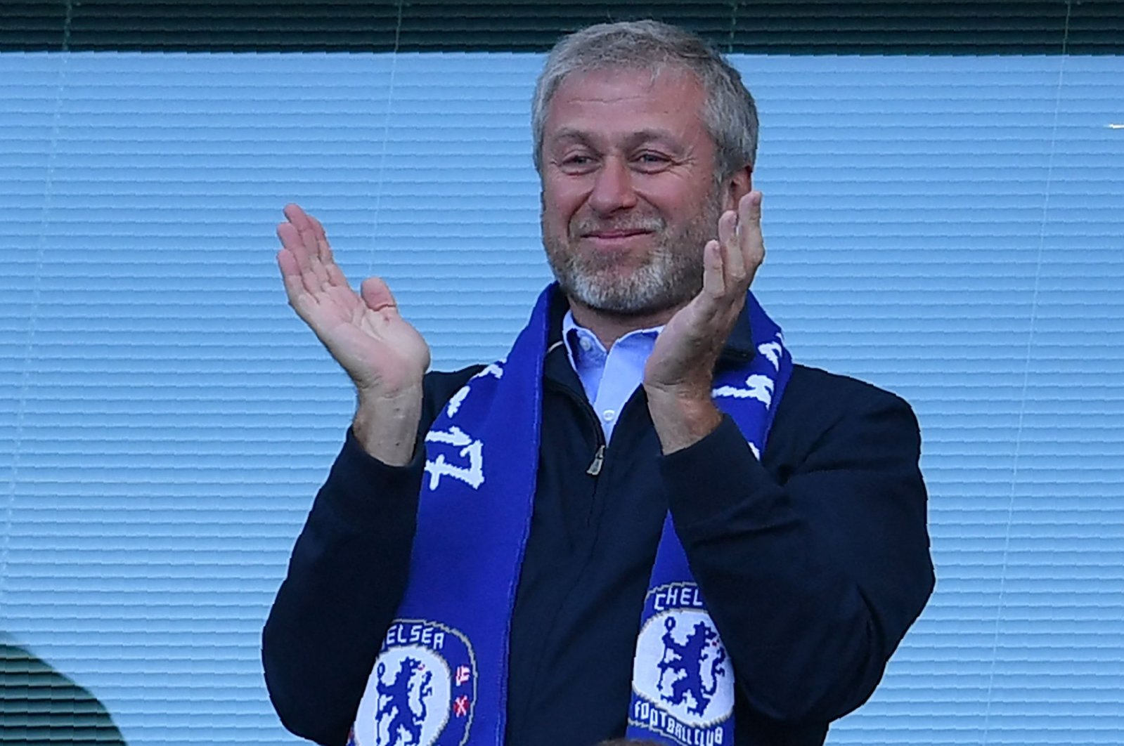 Chelsea&#039;s Russian owner Roman Abramovich applauds as players celebrate their league title win at the end of the Premier League football match between Chelsea and Sunderland at Stamford Bridge in London, U.K., May 21, 2017. (AFP Photo)