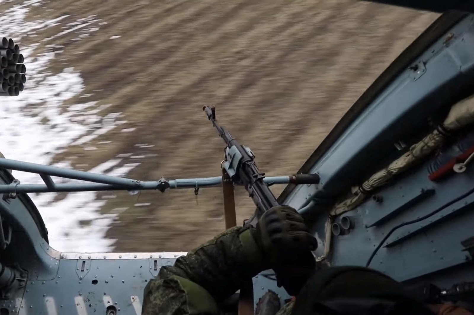 The view from a Russian helicopter as it escorts Russian units in Ukraine in this screengrab obtained from social media, March 2, 2022. (Russian Defense Ministry via Reuters)