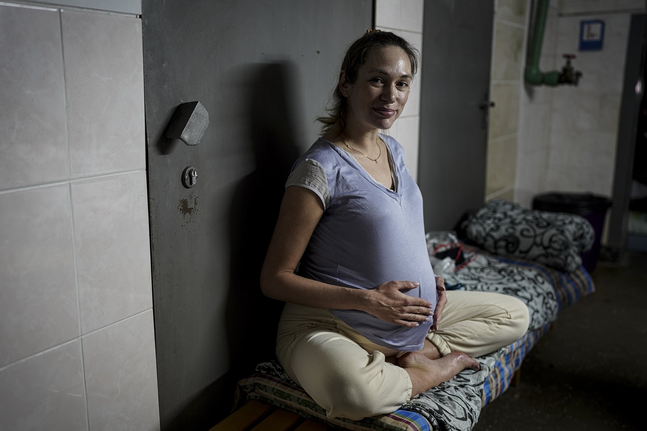 A pregnant women sits on her bed in maternity hospital in Kyiv, Ukraine, March 2, 2022. (Uğur Yıldırım Photo)