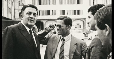 Pasolini with director Federico Fellini in the late 1950s. (Wikimedia)
