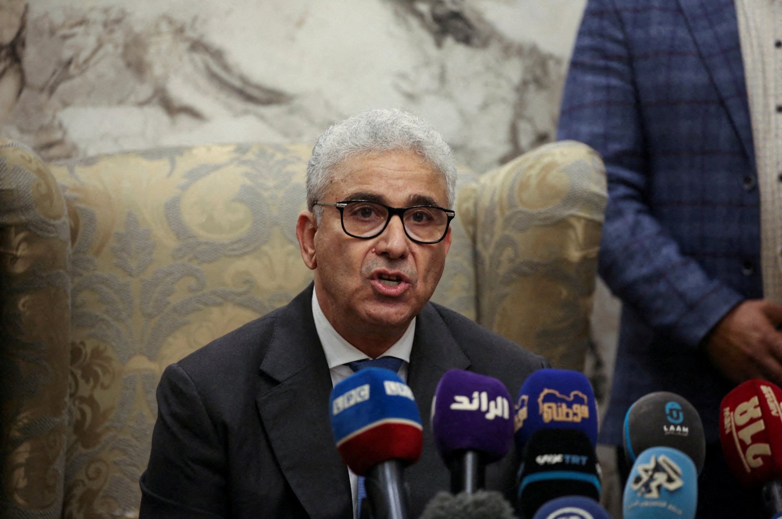Fathi Bashagha, designated as prime minister by Parliament, delivers a speech at Mitiga International Airport, in Tripoli, Libya, Feb. 10, 2022. (Reuters Photo)