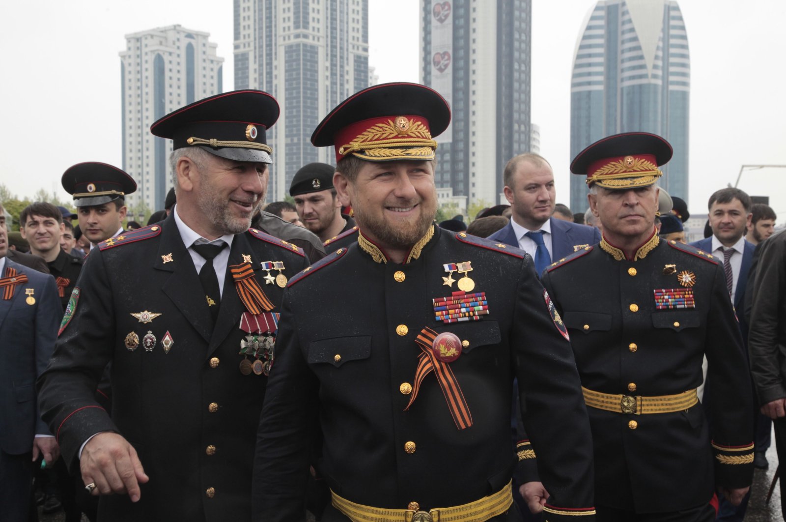 Chechen regional leader Ramzan Kadyrov, center, wearing a Russian military uniform, attends celebrations marking the 70th anniversary of the victory over Nazi Germany, in Chechnya's provincial capital Grozny, Russia, May 9, 2015. (AP Photo)