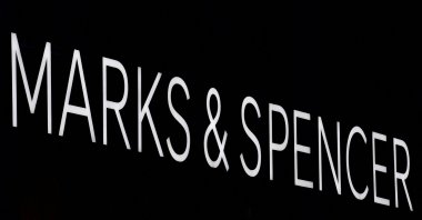 A sign is displayed outside a Marks &amp; Spencer store in London, Britain, Jan. 7, 2016. (Reuters Photo)