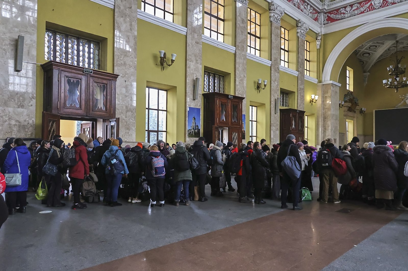 People wait for an evacuation train at a railway station in Kharkiv, Ukraine, March 3, 2022. (EPA Photo)