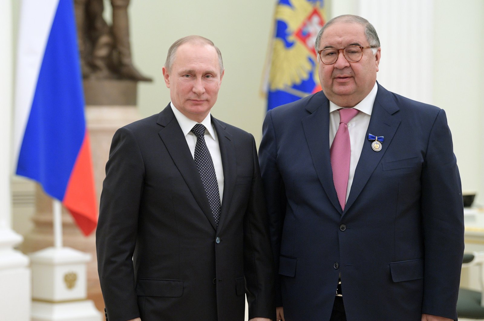 Russian President Vladimir Putin (L), poses for a photo with USM Holdings founder, businessperson Alisher Usmanov during an awarding ceremony in Moscow&#039;s Kremlin, Russia, Jan. 26, 2017. (AP Photo)