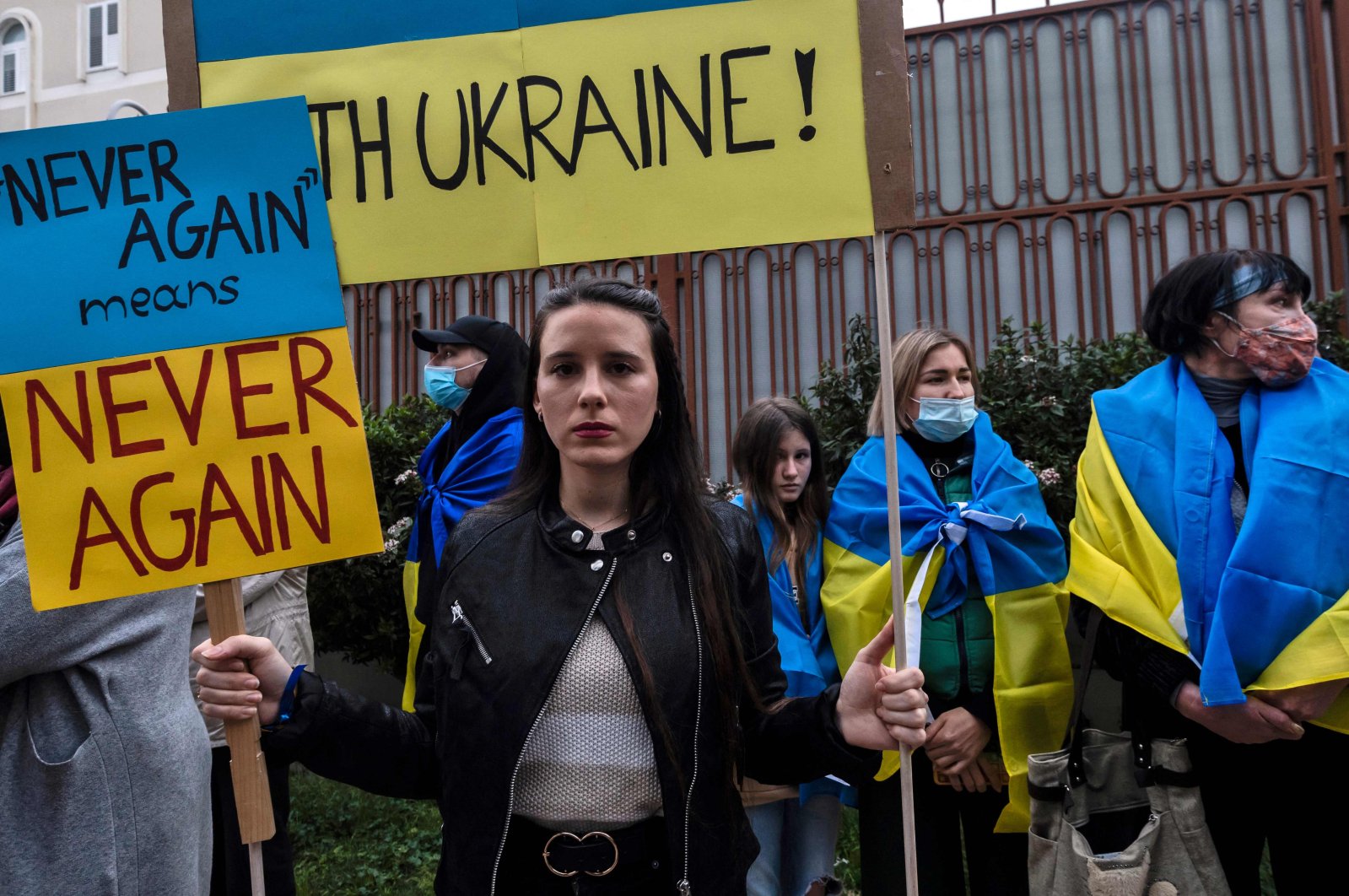 Ukrainians and Cypriots take part in a protest against Russia&#039;s military invasion of Ukraine, outside the Russian embassy in the Cypriot capital Lefkoşa (Nicosia) on March 1, 2022. (AFP Photo)