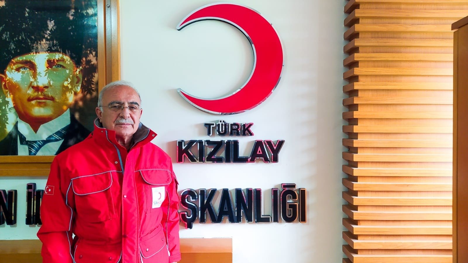Mevlüt Günay, the head of Kızılay in Nazilli, poses for a photo at the Turkish Red Crescent branch in western Aydın province, Turkey, March 5, 2022. (IHA Photo)