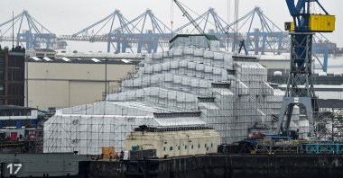The 156 meters Dilbar superyacht owned by Russian billionaire Alisher Usmanov, lies in the Blohm &amp; Voss dock in the harbor in Hamburg, Germany, March 3, 2022. (Reuters Photo)