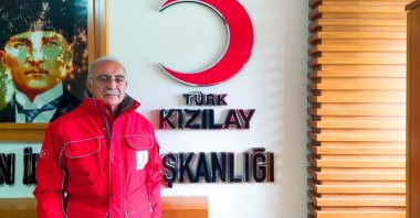 Mevlüt Günay, the head of Kızılay in Nazilli, poses for a photo at the Turkish Red Crescent branch in western Aydın province, Turkey, March 5, 2022. (IHA Photo)