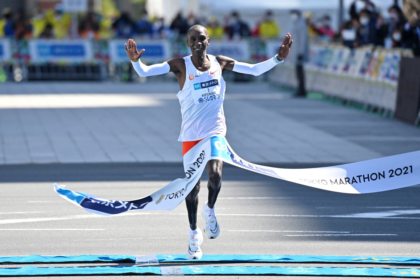 Kenyan Eliud Kipchoge crosses the finish line to win the men's category in the Tokyo Marathon in Tokyo, Japan March 6, 2022. Kazuhiro Nogi/Pool via REUTERS