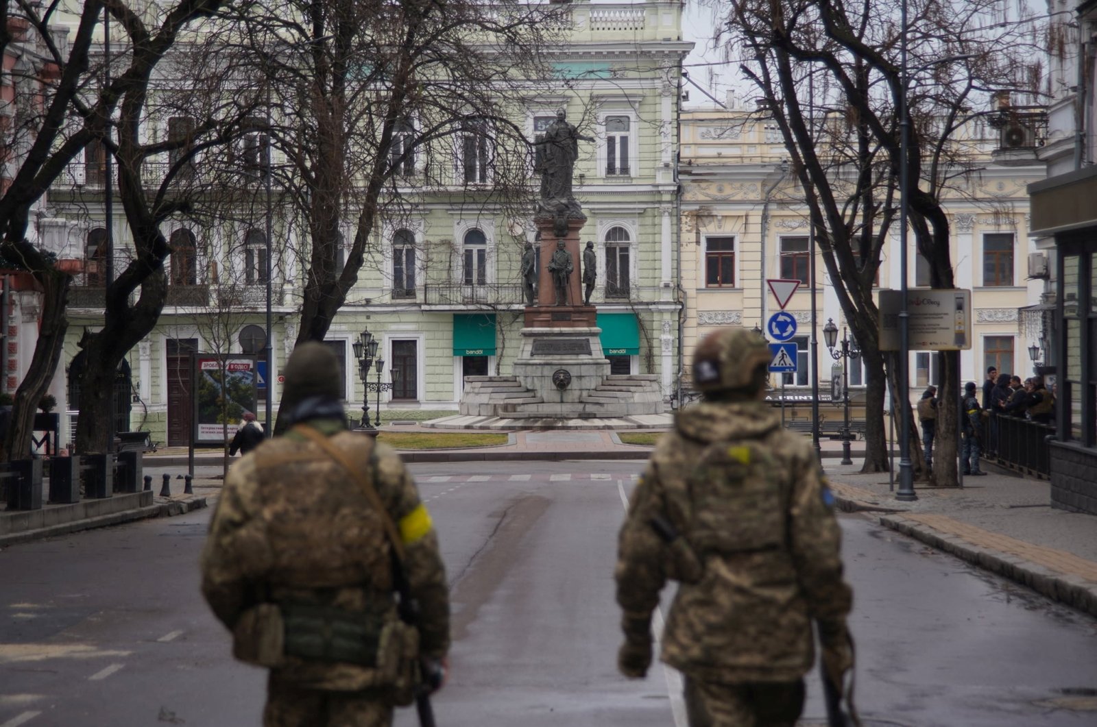 Members of Ukraine&#039;s Territorial Defence Forces patrol a street, amid the Russian invasion of Ukraine, in Odessa, Ukraine, in this handout picture released March 4, 2022. (Press Service of the 28th Separate Mechanised Brigade/Handout via Reuters)