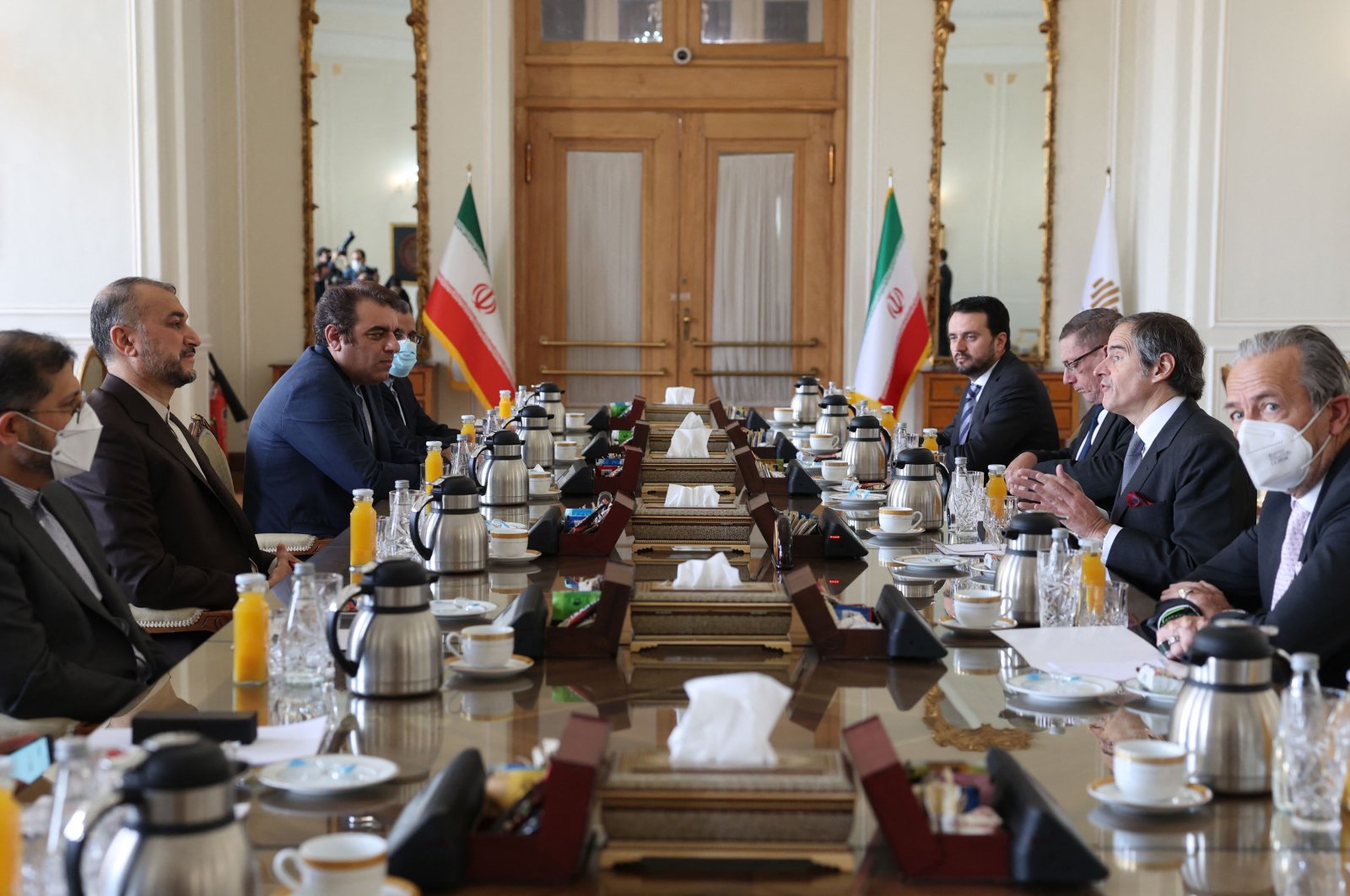 Iranian Foreign Minister Hossein Amir-Abdollahian (C-L) meets with Head of the International Atomic Energy Agency (IAEA) Rafael Grossi (C-R) in the capital Tehran, Iran, March 5, 2022. (AFP Photo)