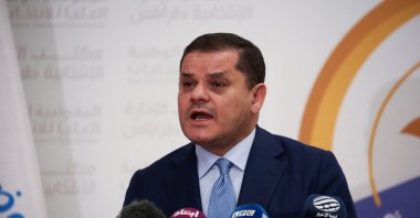 Libyan Prime Minister Abdul Hamid Dbeibah speaks after submitting his candidacy papers for the upcoming presidential election at the headquarters of the electoral commission in Tripoli, Libya, Nov. 21, 2021. (Reuters File Photo)