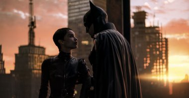 This image released by Warner Bros. Pictures shows Zoe Kravitz (L) and Robert Pattinson in a scene from "The Batman." (AP Photo)