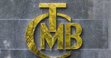 A logo of Turkey's Central Bank is pictured at the entrance of its headquarters in Ankara, Turkey, Oct. 15, 2021. (Reuters Photo)