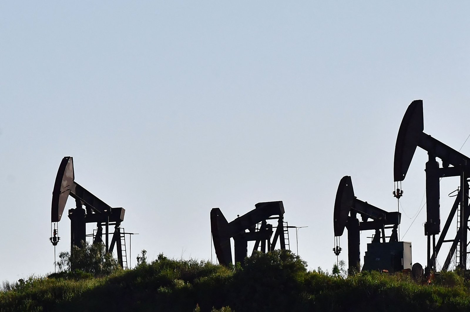Working pumpjacks are seen in the Montebello Oil Field in Montebello, California, U.S., Feb. 23, 2022. (AFP Photo)