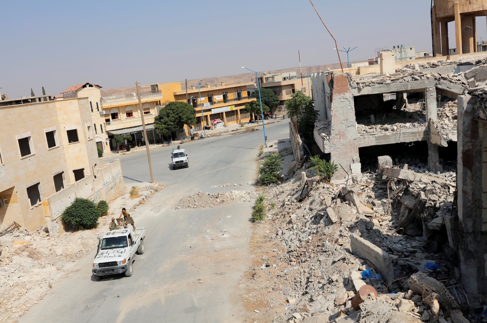 Members of Turkish-backed Free Syrian Army (FSA) patrol in the border town of Jarablus, Syria, Aug. 31, 2016. (Reuters File Photo)