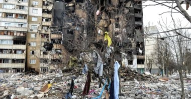 This picture shows an apartment building damaged after shelling in Ukraine's second-biggest city of Kharkiv, March 8, 2022. (AFP Photo)