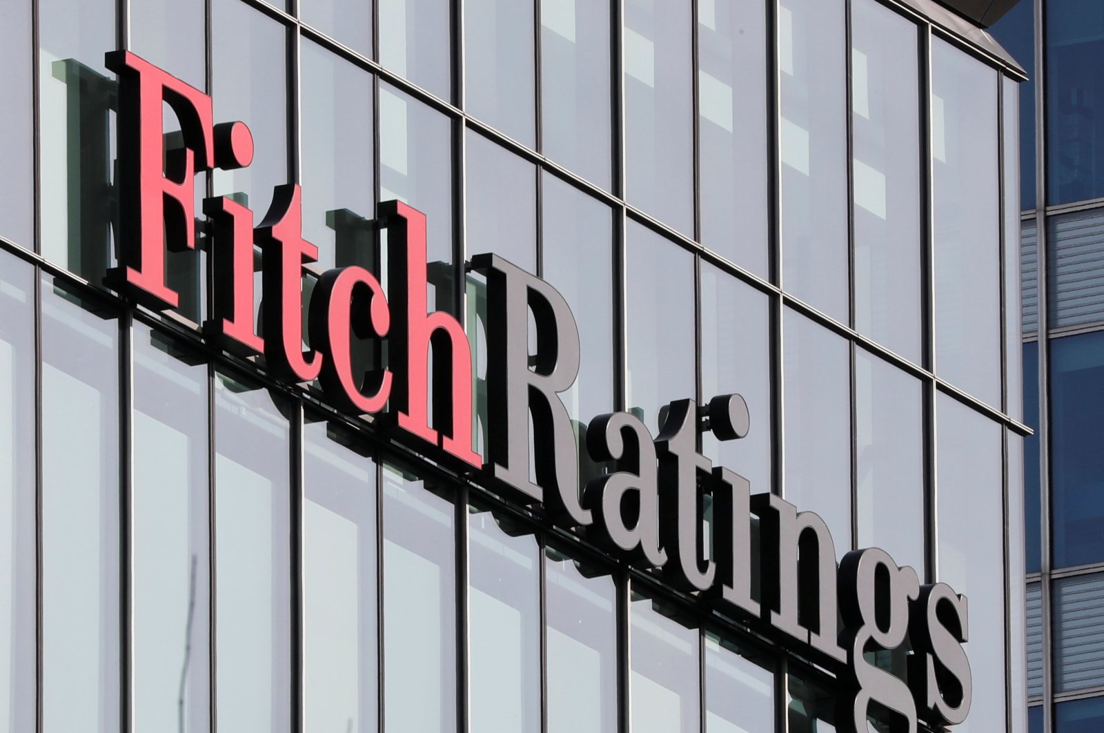 The Fitch Ratings logo is seen at their offices at Canary Wharf financial district in London, Britain, March 3, 2016. (Reuters Photo)
