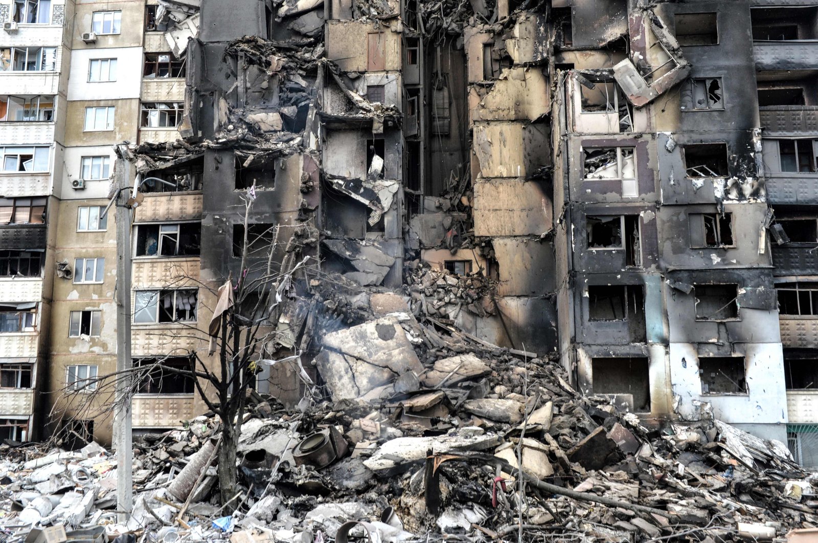 An apartment building destroyed after shelling the day before in Ukraine&#039;s second-biggest city of Kharkiv, Ukraine, March 8, 2022. (AFP Photo)