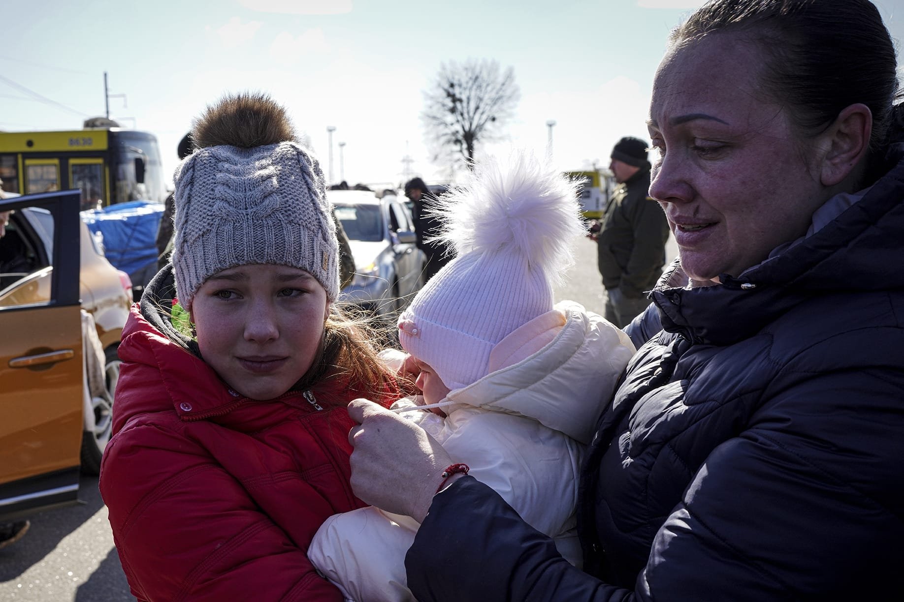 Ukrainian civilians flee with white flags amid Russian invasion | Daily ...