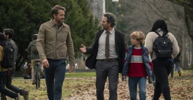 This image released by Netflix shows Ryan Reynolds (L), Mark Ruffalo (C) and Walker Scobel in a scene from &quot;The Adam Project.&quot; (AP Photo)