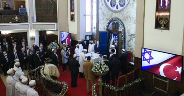 Israel&#039;s President Isaac Herzog,(R), attends a ceremony during his visit to Neve Shalom Synagogue, in Istanbul, Turkey, March 10, 2022. (AP)