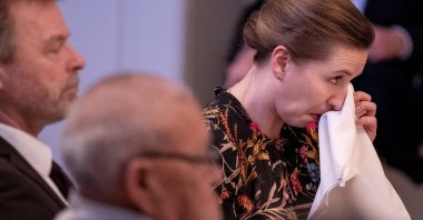 Danish Prime Minister Mette Frederiksen reacts after delivering a face-to-face apology to six living victims of a 1950s social experiment, at the National Museum, in Copenhagen, Denmark, March 9, 2022. (Reuters Photo)