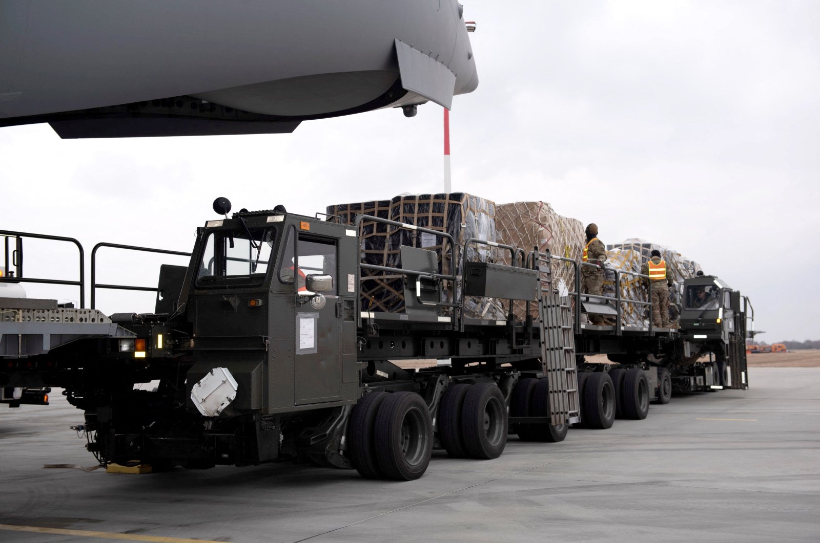 A handout photo taken on March 4, 2022, and released by the Australian Defence Force on March 6, 2022, shows a Royal Australian Air Force C-17A Globemaster delivering defensive military assistance to the Ukrainian government at an undisclosed location. (AFP Photo)