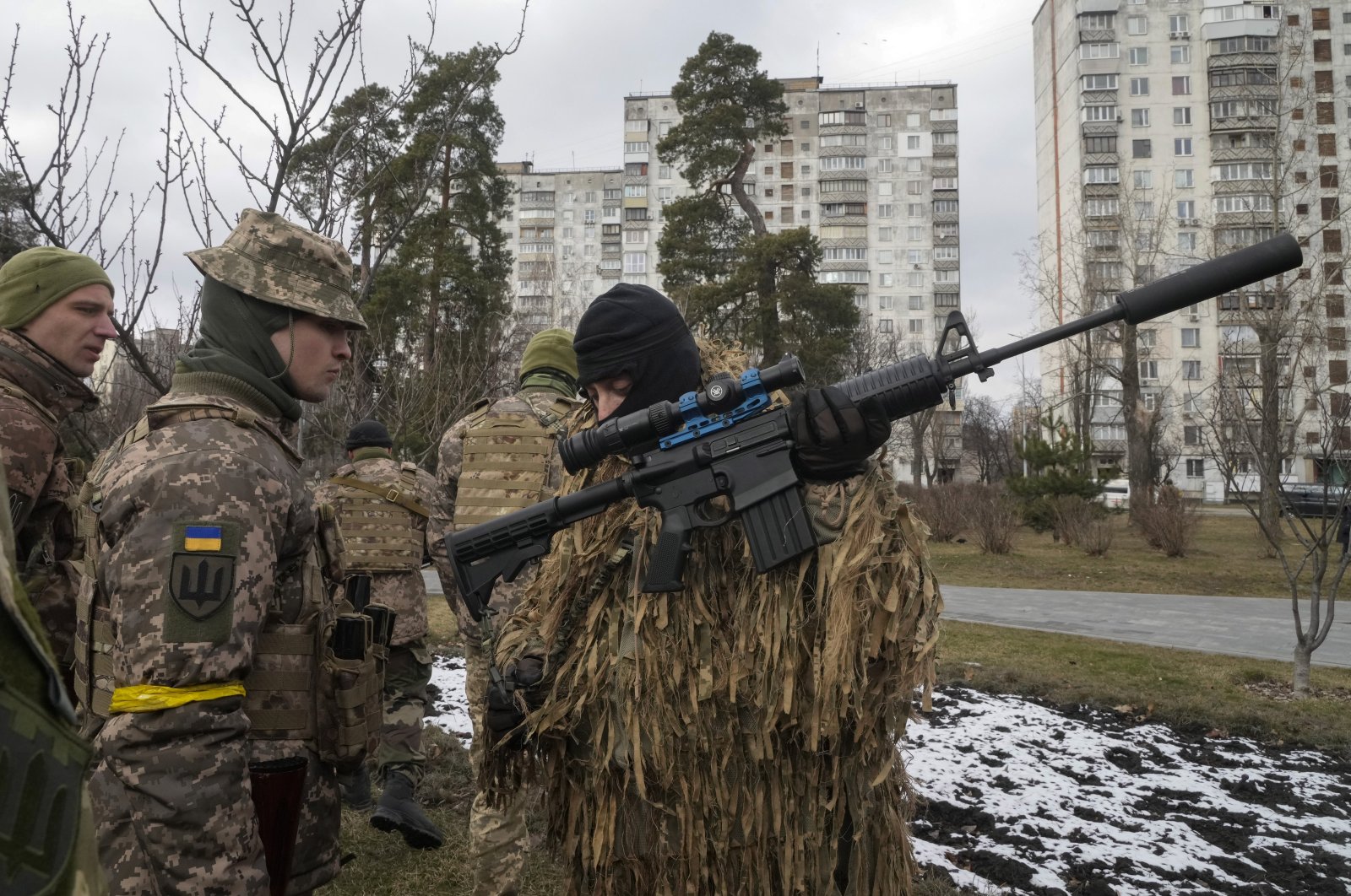 Ukrainian Territorial Defence Forces members prepare to repel the Russian army assault on the Kyiv outskirts, Ukraine, March 9, 2022. (AP Photo)