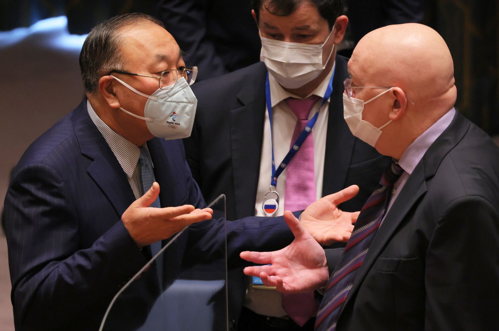 Chinese Ambassador Zhang Jun and Russian Ambassador Vasily Nebenzia speak before the start of a meeting to discuss the humanitarian crisis in Ukraine at the United Nations headquarters in New York, U.S., March 7, 2022. (AFP Photo)
