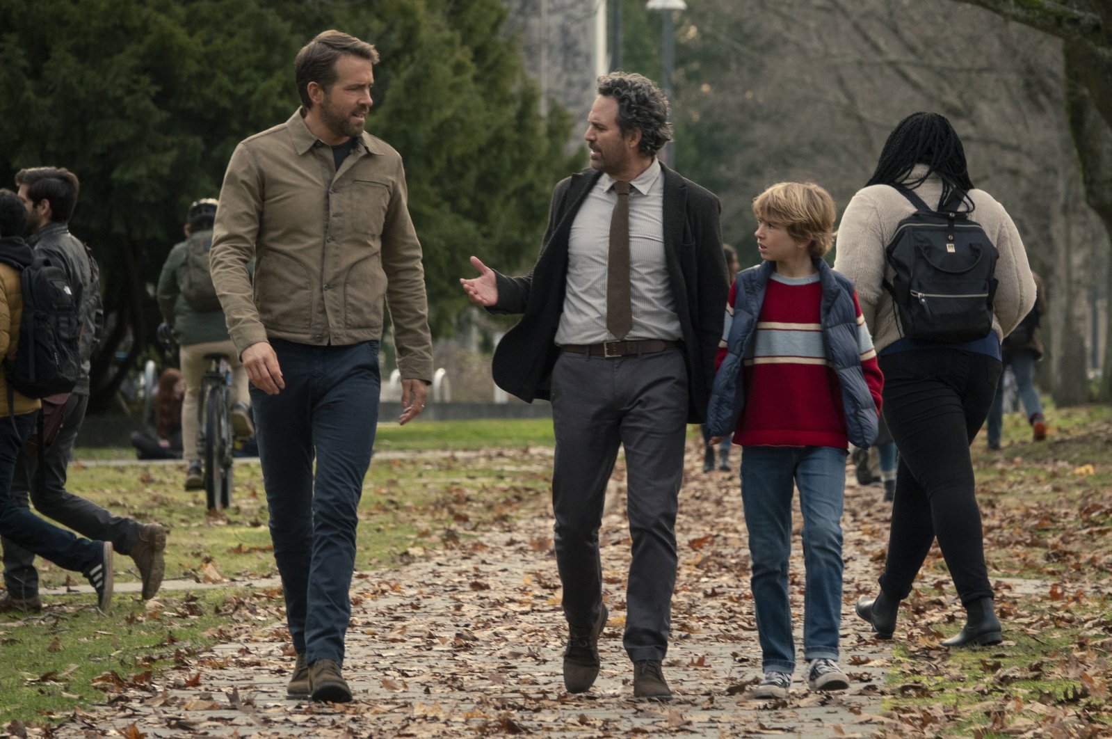 This image released by Netflix shows Ryan Reynolds (L), Mark Ruffalo (C) and Walker Scobel in a scene from &quot;The Adam Project.&quot; (AP Photo)