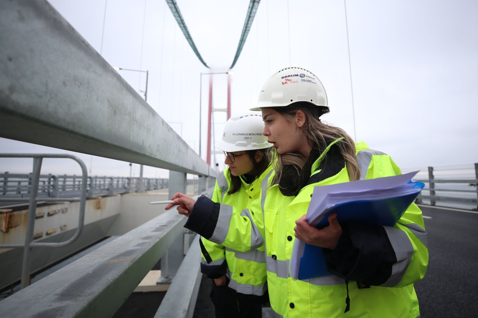 Women employees inspect a newly-built bridge in Çanakkale, northwestern Turkey, March 8, 2022. (AA Photo)