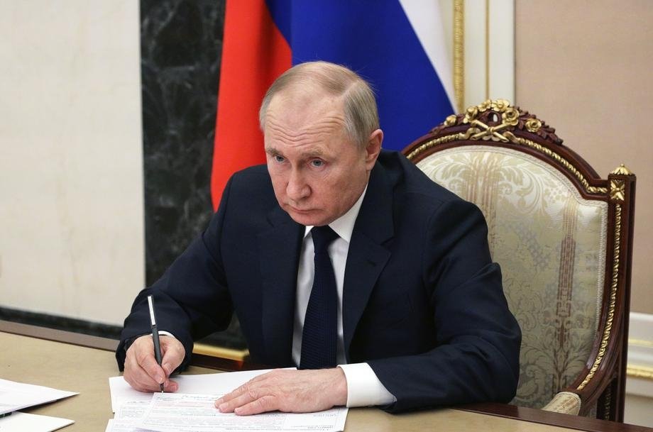 Russian President Vladimir Putin attends a videoconference meeting with government members at the Kremlin in Moscow, Russia, March 10, 2022. (EPA via the Kremlin)