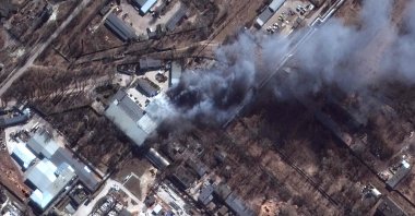 This Maxar satellite image taken and released on March 10, 2022, shows a close-up of fires burning in an industrial area in southern Chernihiv, Ukraine. (AFP Photo / Satellite image ©2022 Maxar Technologies)