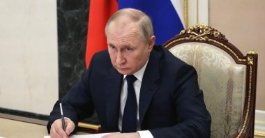 Russian President Vladimir Putin attends a videoconference meeting with government members at the Kremlin in Moscow, Russia, March 10, 2022. (EPA via the Kremlin)