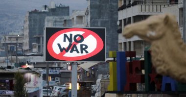 An electronic billboard reading "No war," Azaz, Syria, March 9, 2022. (Reuters Photo)