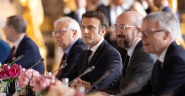 French President Emmanuel Macron sits by President of the European Council Charles Michel and High Representative of the European Union for Foreign Affairs and Security Policy Josep Borrell, and EU heads of state as he attends an informal meeting at the Chateau de Versailles, in Versailles, France, March 11, 2022. (Reuters Photo)