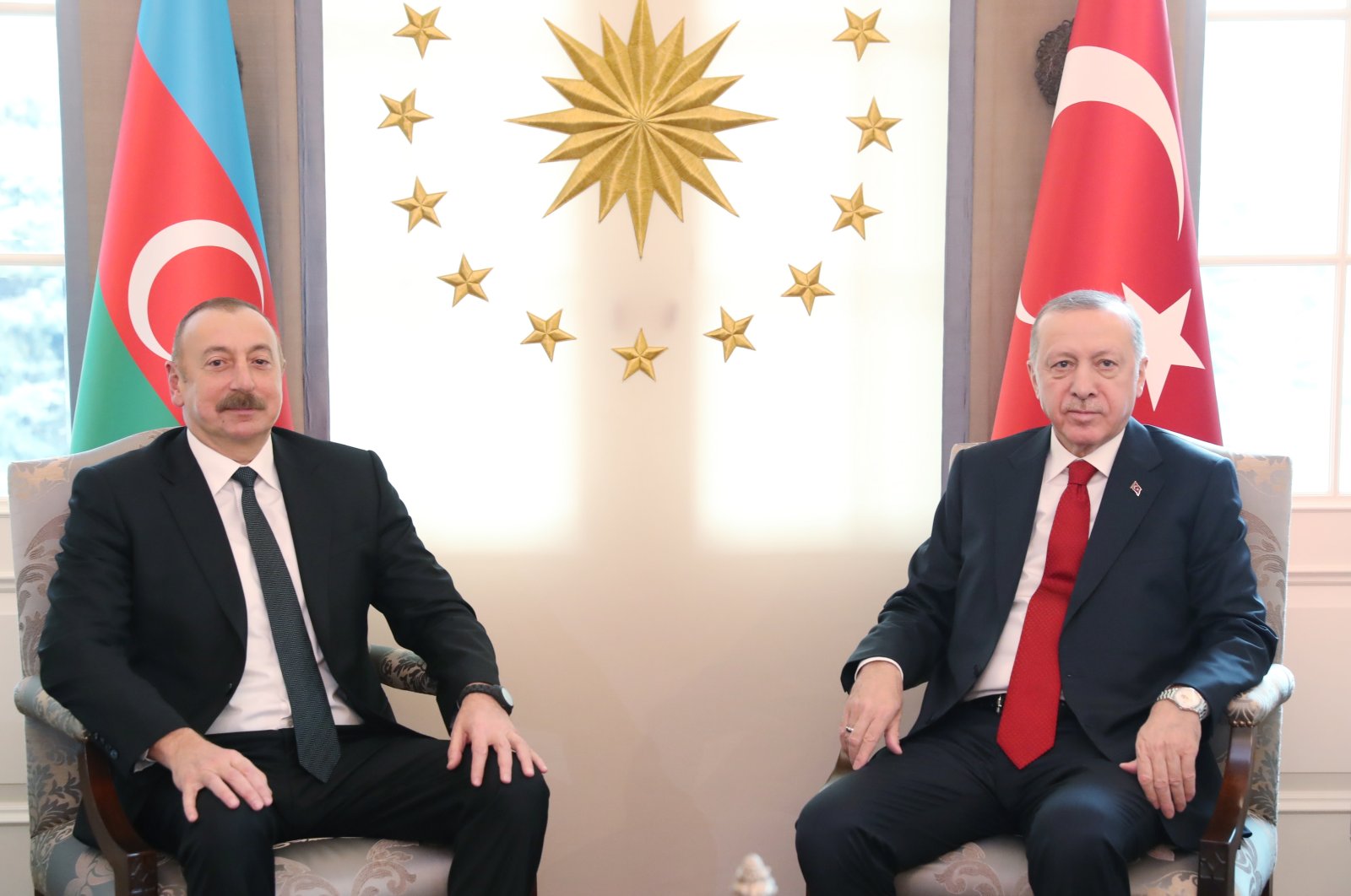 President Recep Tayyip Erdoğan (R) and Azerbaijani President Ilham Aliyev pose for a photo during their meeting at the presidential palace in Ankara, Turkey, March 10, 2022. (EPA Photo)