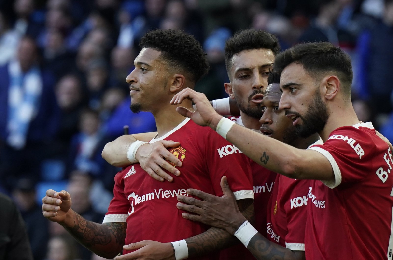Manchester United players celebrate a goal during a Premier League match against Manchester City at the Etihad Stadium in Manchester, Britain, March 6, 2022. (EPA Photo)
