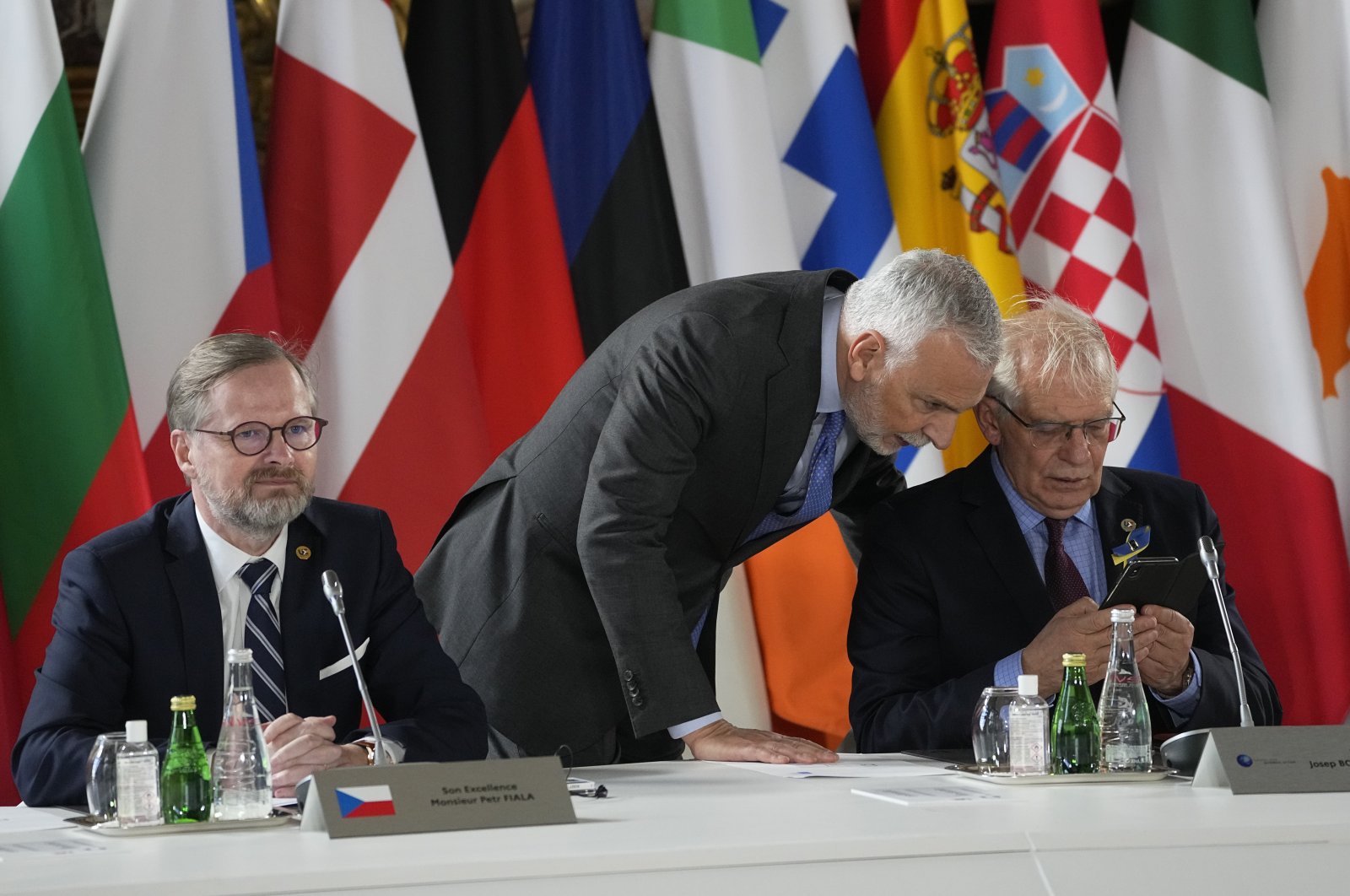 Czech Republic&#039;s Prime Minister Petr Fiala (L) and European Union foreign policy chief Josep Borrell attend a round table meeting at an EU summit at the Chateau de Versailles, in Versailles, west of Paris, March 10, 2022. (AP Photo)