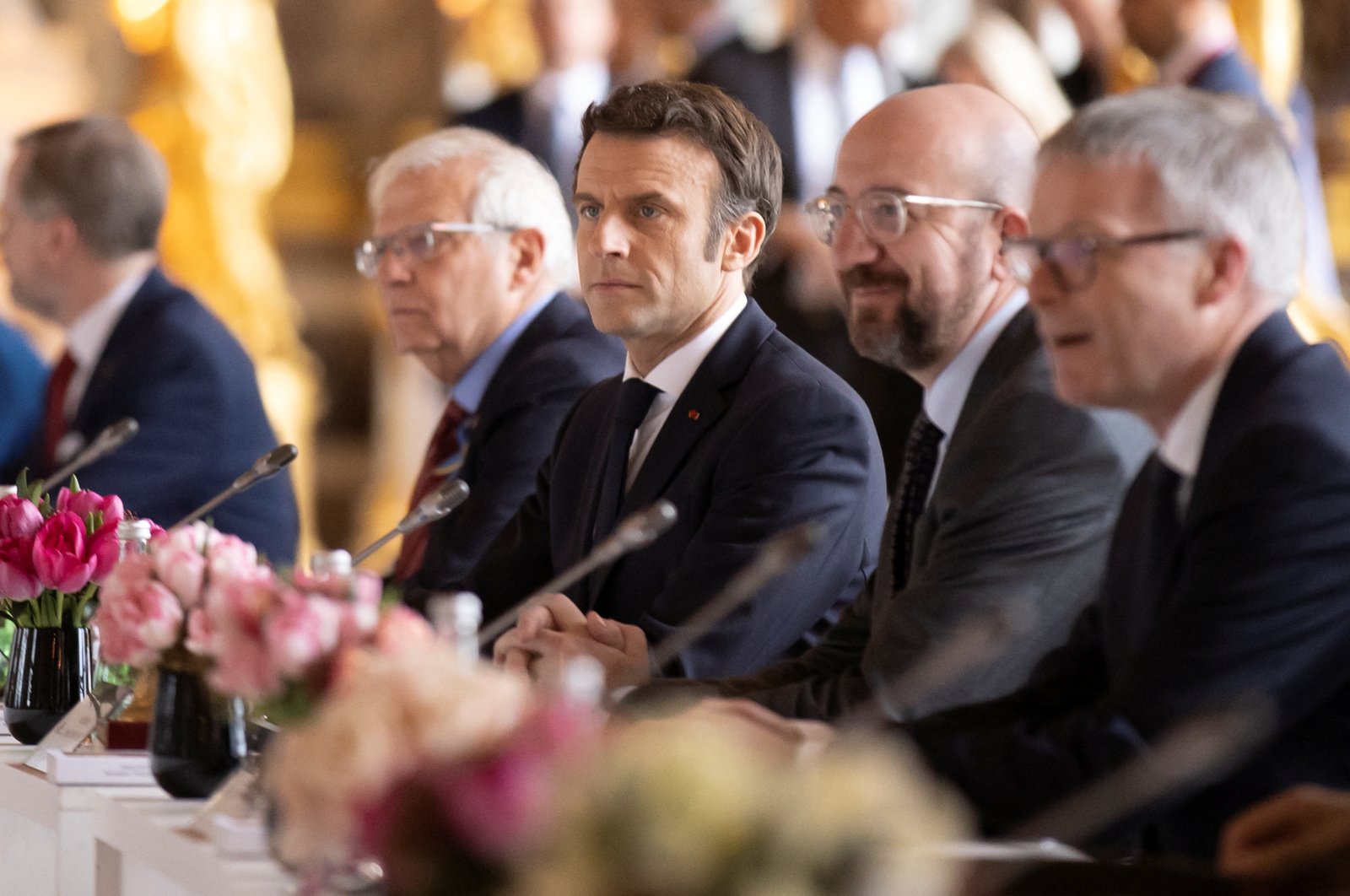 French President Emmanuel Macron sits by President of the European Council Charles Michel and High Representative of the European Union for Foreign Affairs and Security Policy Josep Borrell, and EU heads of state as he attends an informal meeting at the Chateau de Versailles, in Versailles, France, March 11, 2022. (Reuters Photo)
