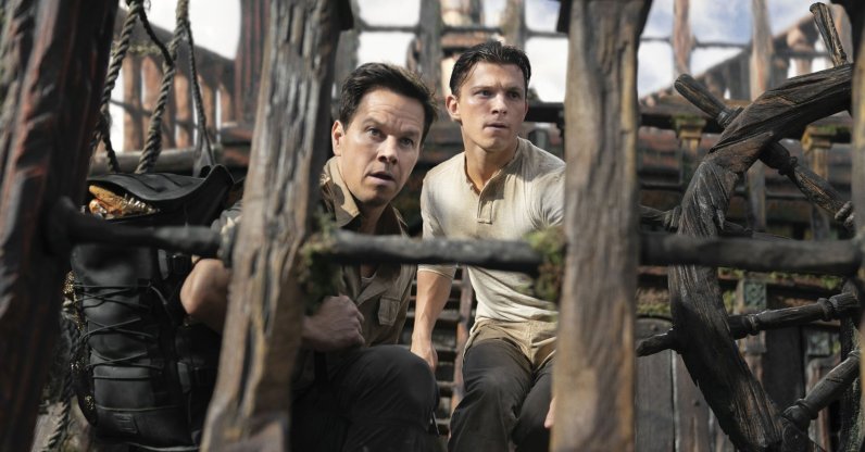 Mark Wahlberg (L) and Tom Holland, in a scene from the film "Uncharted." (AP Photo)