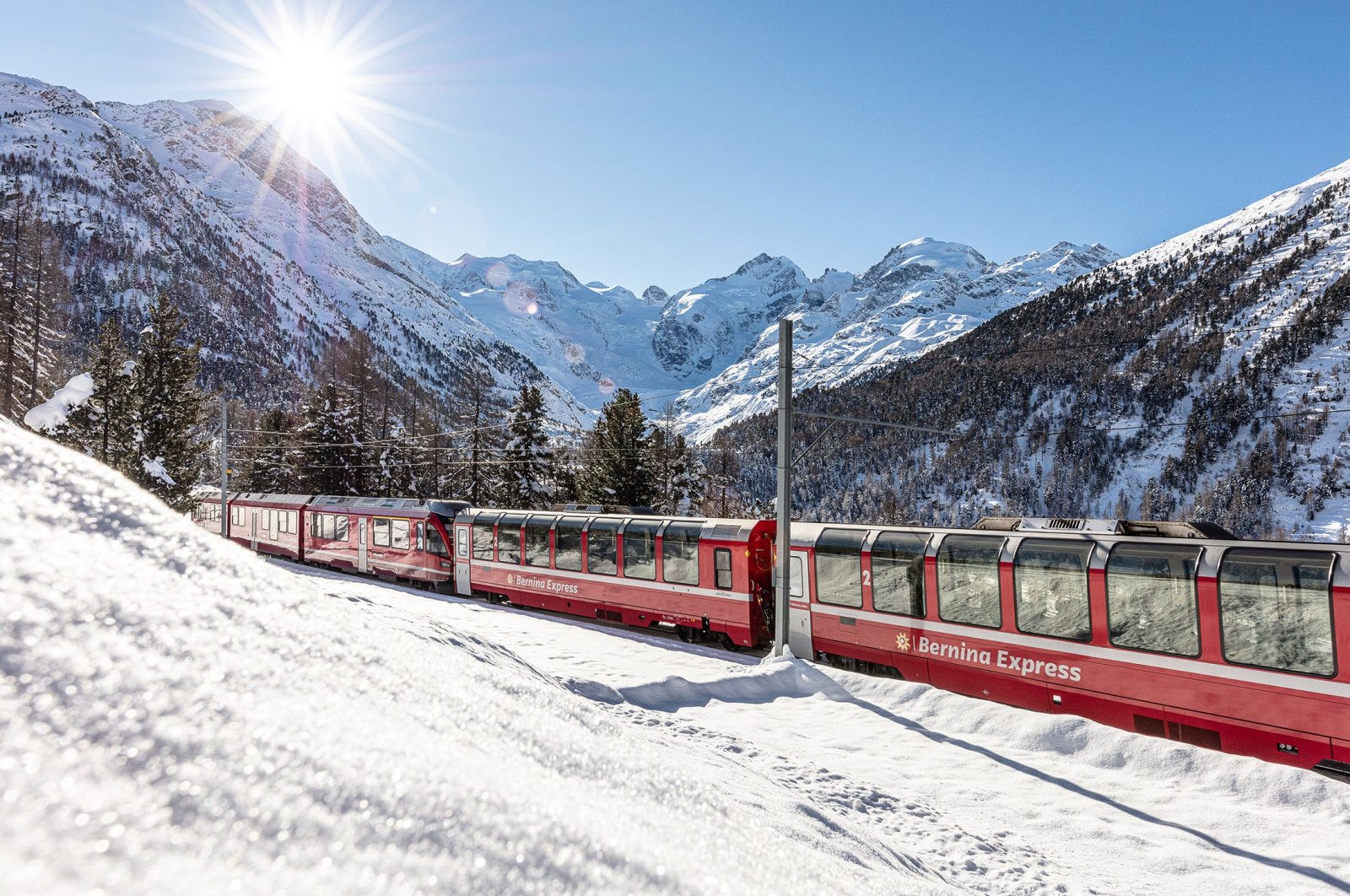 The Bernina Express railway makes its way up the snow-covered Swiss mountains. (Rhatische Bahn via dpa)