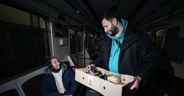 Onur Hekim delivers food to Ukrainians sheltering at a metro station, in Kyiv, Ukraine, March 14, 2022. (AA PHOTO)
